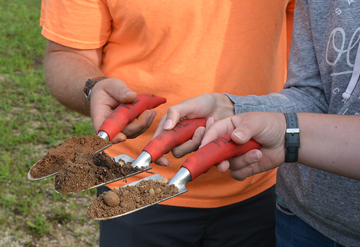 Students compare glacial soils.