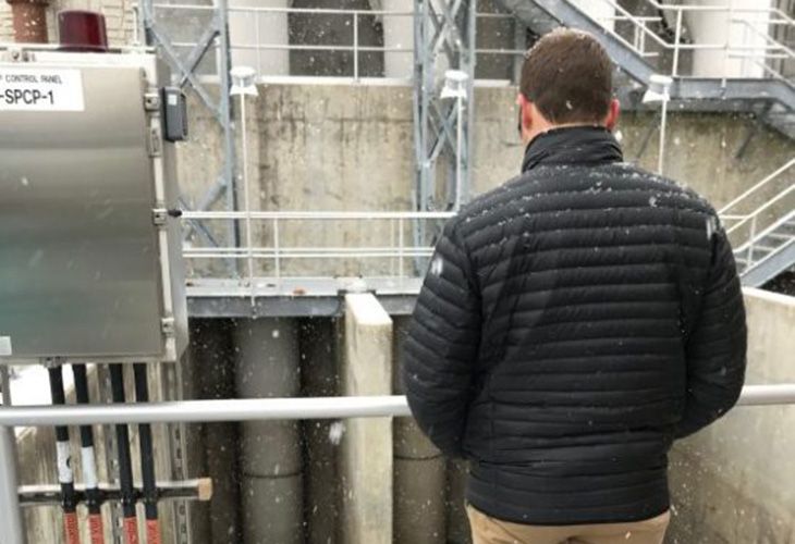 Merry Lea’s Dr. Joel Pontius ponders a scene from Goshen’s Wet Weather Detention Center. The equipment includes a grinder that could chew up a school bus.